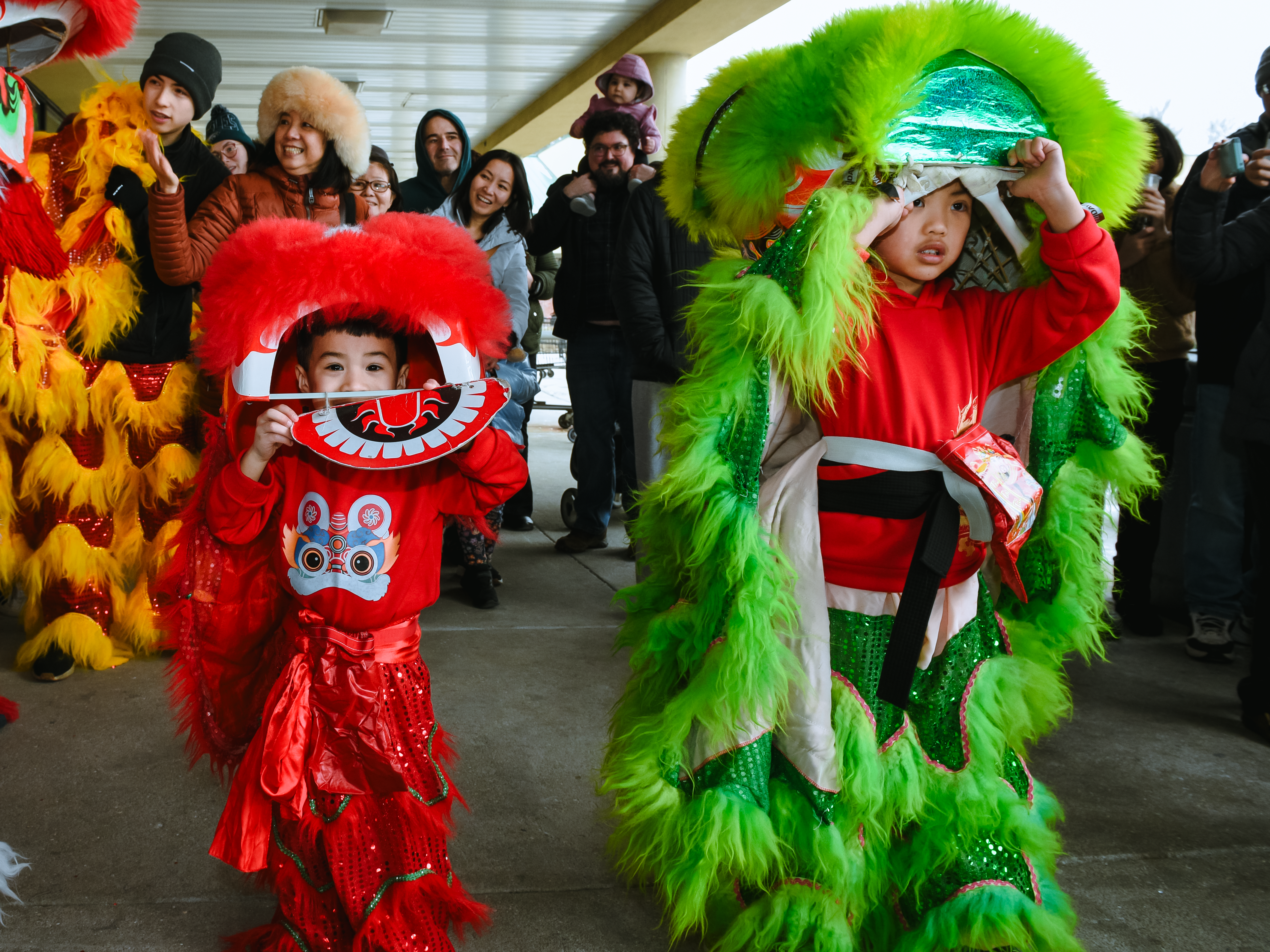Young Bao Bao Lions performers with their lions